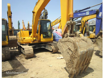 Гусеничний екскаватор KOMATSU PC130-7: фото 1