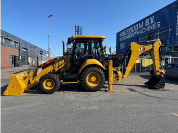 Екскаватор-навантажувач CATERPILLAR