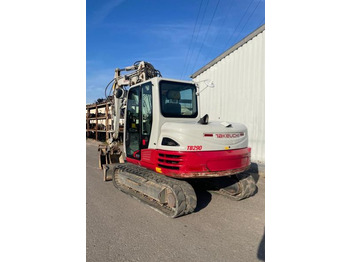 Гусеничний екскаватор TAKEUCHI