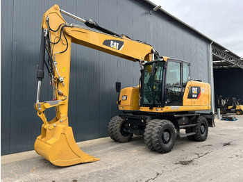 Колісний екскаватор CATERPILLAR M318F