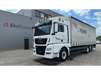Тентована вантажівка MAN TGX 26.400
