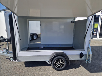 Торговий причіп Cargo Roadster 300 300x150x184cm Sandwich weiß Poly black Seitenklappe &Tür Alufelgen 1300kg Pullman: фото 2 Торговий причіп Cargo Roadster 300 300x150x184cm Sandwich weiß Poly black Seitenklappe &Tür Alufelgen 1300kg Pullman: фото 2