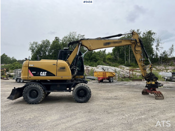 Колісний екскаватор CAT M313D with tipping wagon and attachments (VIDEO): фото 3