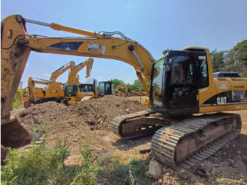 Гусеничний екскаватор CATERPILLAR 318