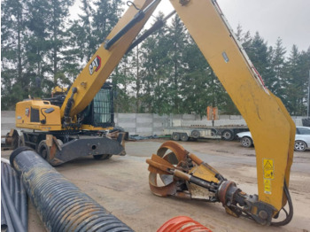 Колісний екскаватор CATERPILLAR