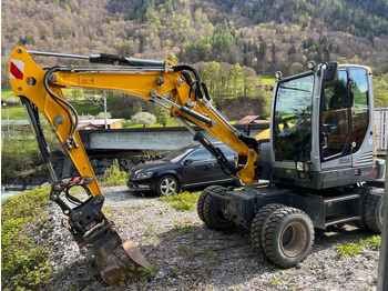 Колісний екскаватор WACKER