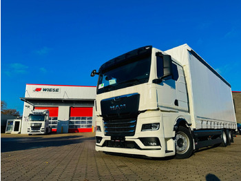 Тентована вантажівка MAN TGX 26.440