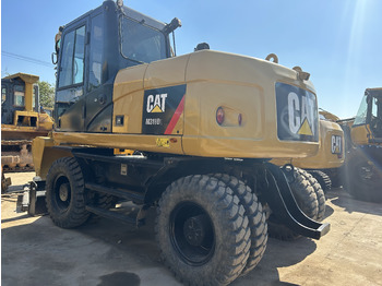 Колісний екскаватор CATERPILLAR M318