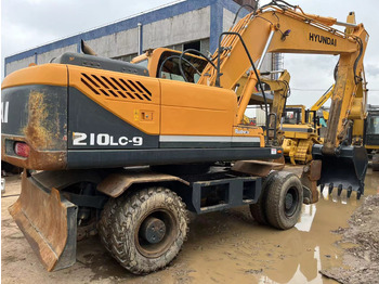 Колісний екскаватор HYUNDAI R210
