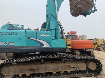 Гусеничний екскаватор KOBELCO