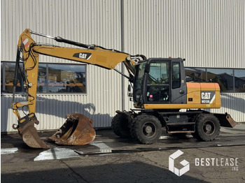 Колісний екскаватор CATERPILLAR M313D