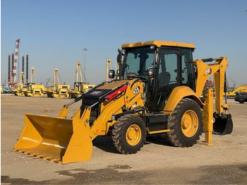 Екскаватор-навантажувач CATERPILLAR