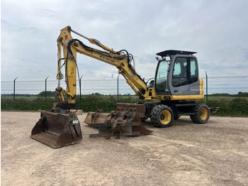 Колісний екскаватор NEW HOLLAND