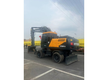 Колісний екскаватор HYUNDAI R210