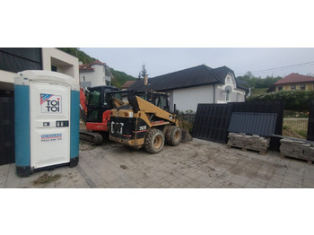 Міні-навантажувач CATERPILLAR