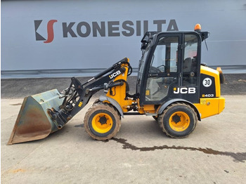 Компактний фронтальний навантажувач JCB