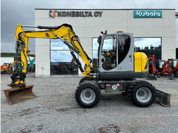 Колісний екскаватор WACKER
