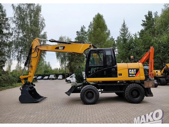 Колісний екскаватор CATERPILLAR M313D