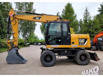Колісний екскаватор CATERPILLAR M313D