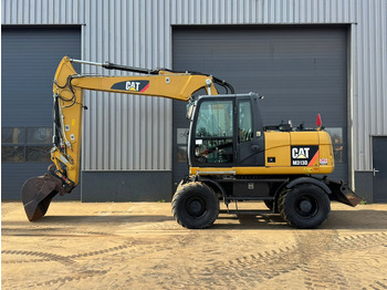 Колісний екскаватор CATERPILLAR M313D