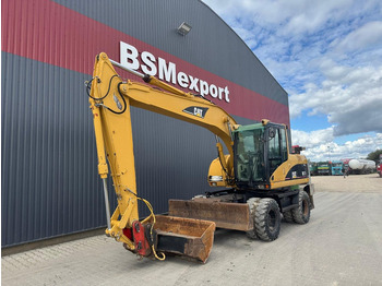 Колісний екскаватор CATERPILLAR M315C