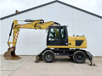 Колісний екскаватор CATERPILLAR M313D