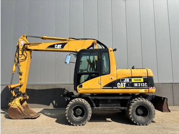 Колісний екскаватор CATERPILLAR M313C