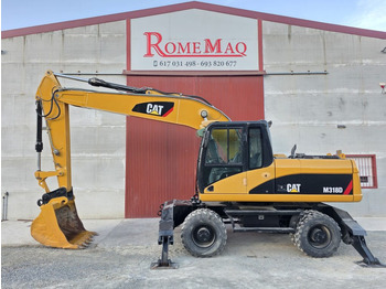 Колісний екскаватор CATERPILLAR M318D