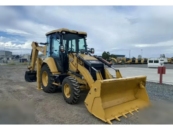 Екскаватор-навантажувач CATERPILLAR