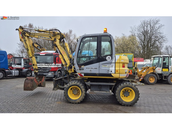 Колісний екскаватор NEW HOLLAND