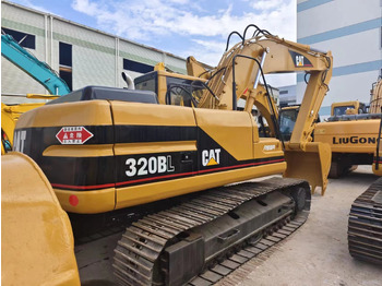 Гусеничний екскаватор CATERPILLAR 320BL