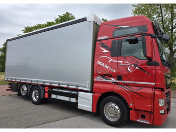Тентована вантажівка MAN TGX 26.500