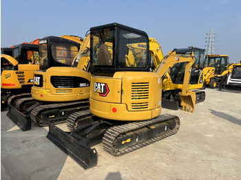 Міні-екскаватор CATERPILLAR