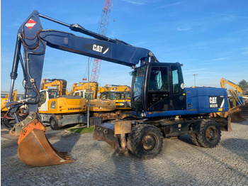 Колісний екскаватор CATERPILLAR M322D