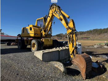 Екскаватор KOMATSU