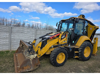 Екскаватор-навантажувач CATERPILLAR