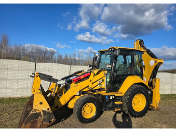 Екскаватор-навантажувач CATERPILLAR