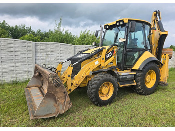 Екскаватор-навантажувач CATERPILLAR