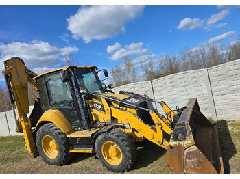 Екскаватор-навантажувач CATERPILLAR