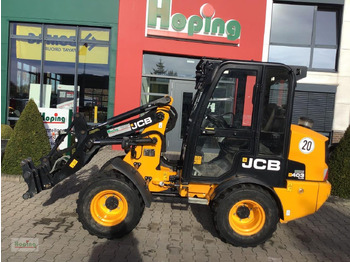 Компактний фронтальний навантажувач JCB