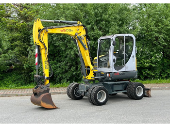 Колісний екскаватор WACKER