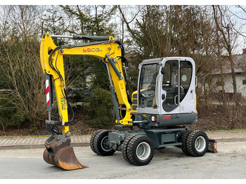 Колісний екскаватор WACKER