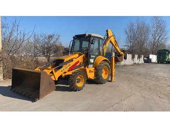 Екскаватор-навантажувач NEW HOLLAND