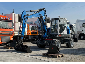 Колісний екскаватор WACKER