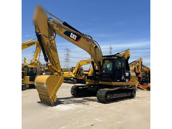 Гусеничний екскаватор CATERPILLAR 323DL