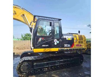 Гусеничний екскаватор CATERPILLAR 323DL