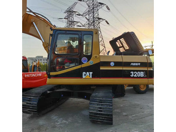 Екскаватор CATERPILLAR