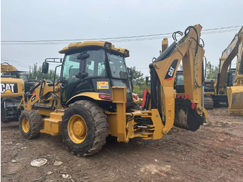 Екскаватор-навантажувач CATERPILLAR