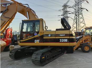 Будівельна техніка CATERPILLAR