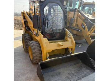 Міні-навантажувач CATERPILLAR